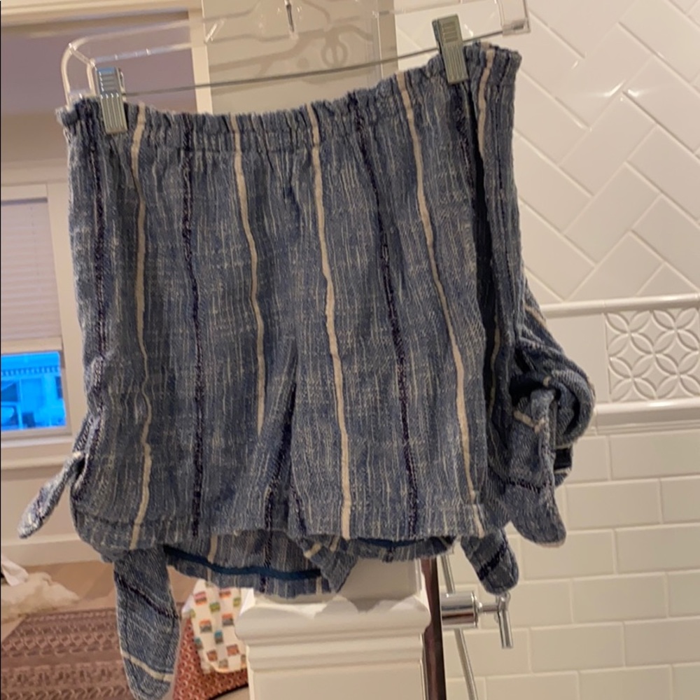 Unique blue and white shorts with ties on the side